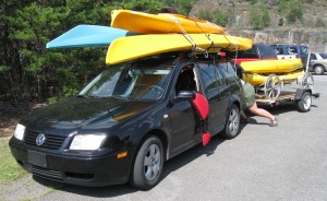 After securing 300 paddlers safety across Carters Lake, Georgia River Network Executive Director April Ingle gets taken by man-eating kayak-car amalgam. 