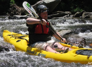 Alan Crawford manuvers through the whitewater of the Upper Coosawattee. 